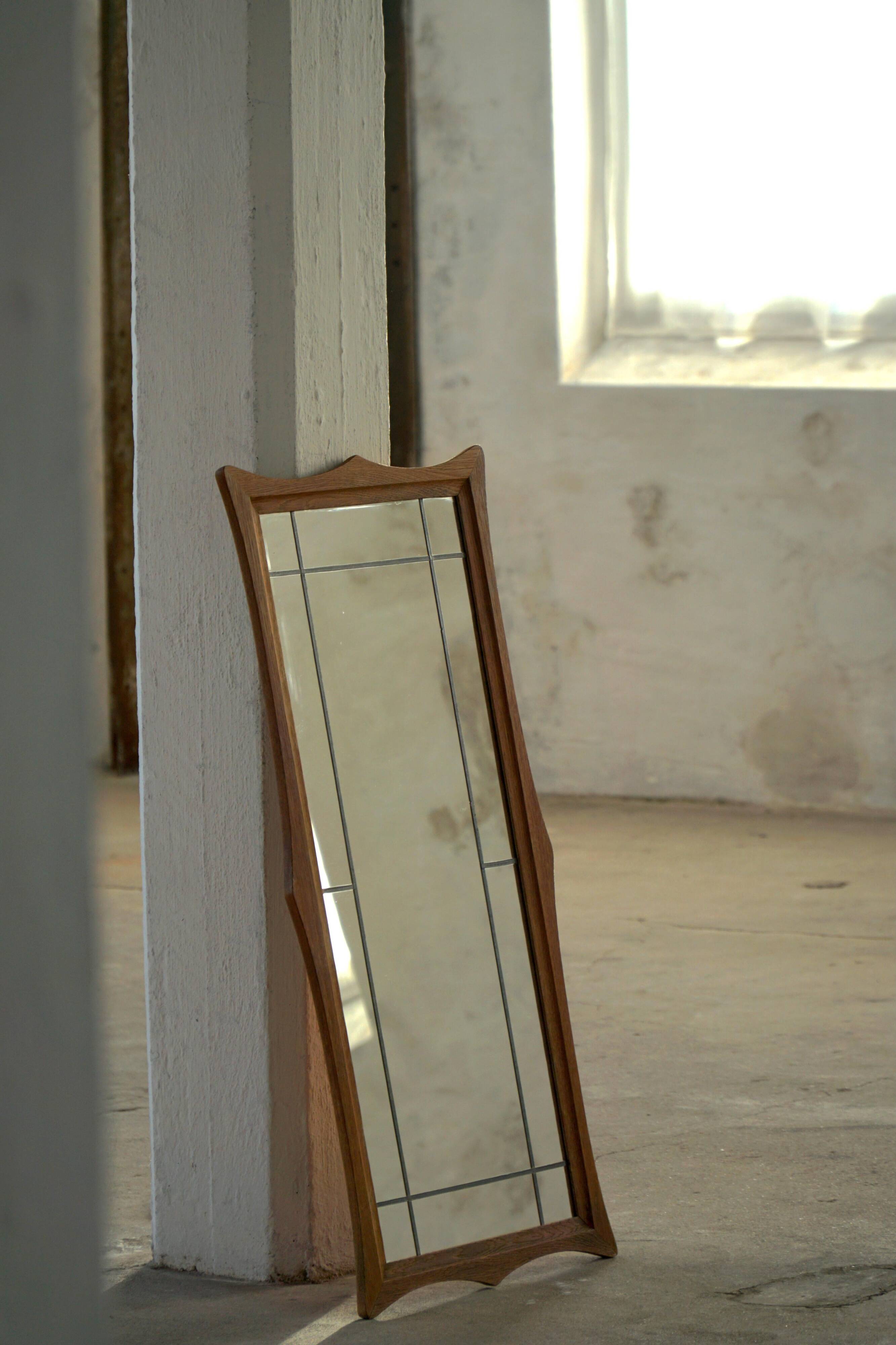 Danish wall mirror in solid oak from the mid-20th century, Scandinavian modern design.