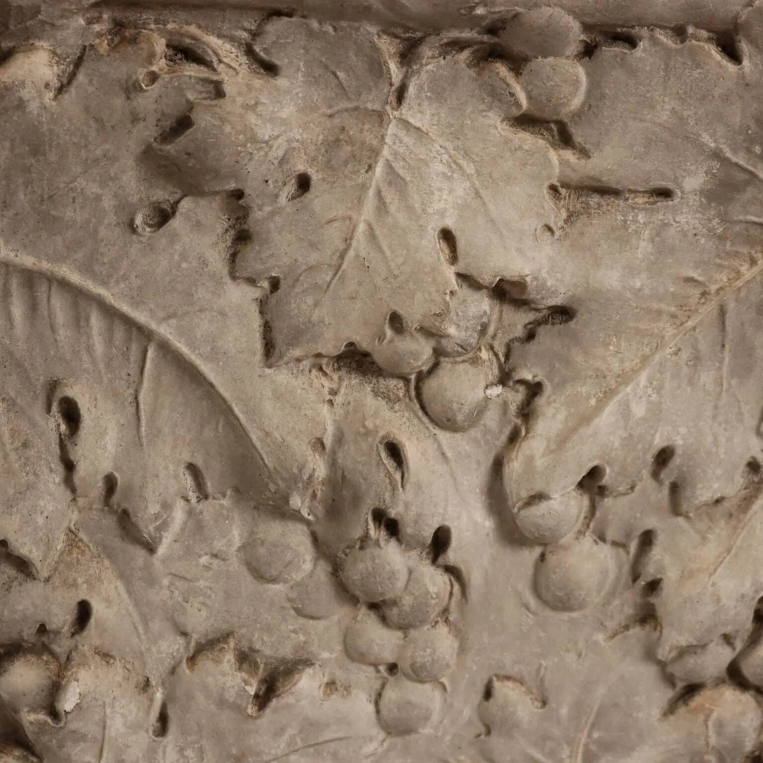 Antique plaster vase decorated with bunches of grapes, Italy, 19th century.