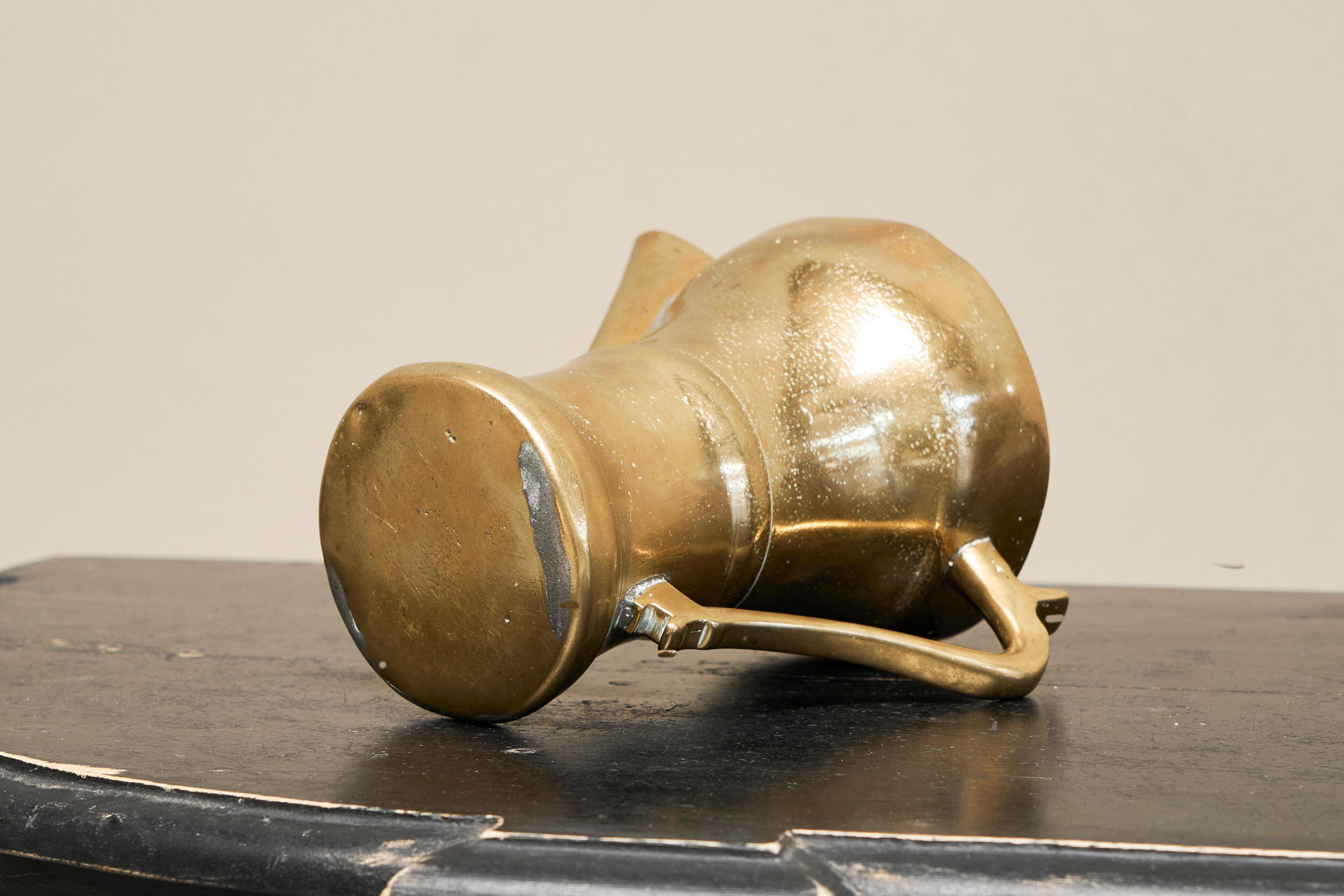 Antique brass jug, 19th century.