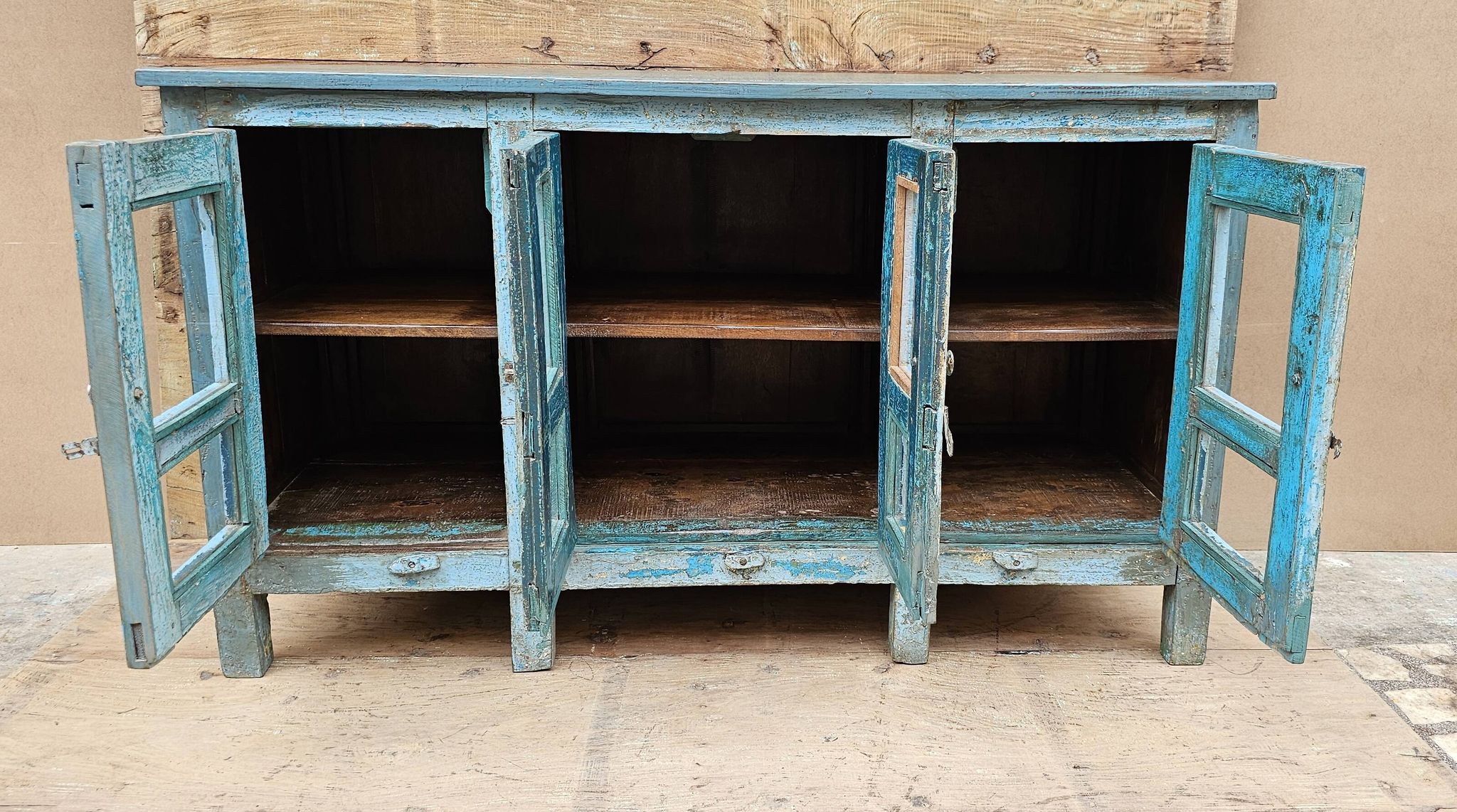 Antique glass-fronted buffet in Burmese teak