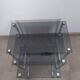 Table gigogne inox et verre fumé