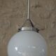 Art Deco suspension globe in white opaline with an aluminium stem.