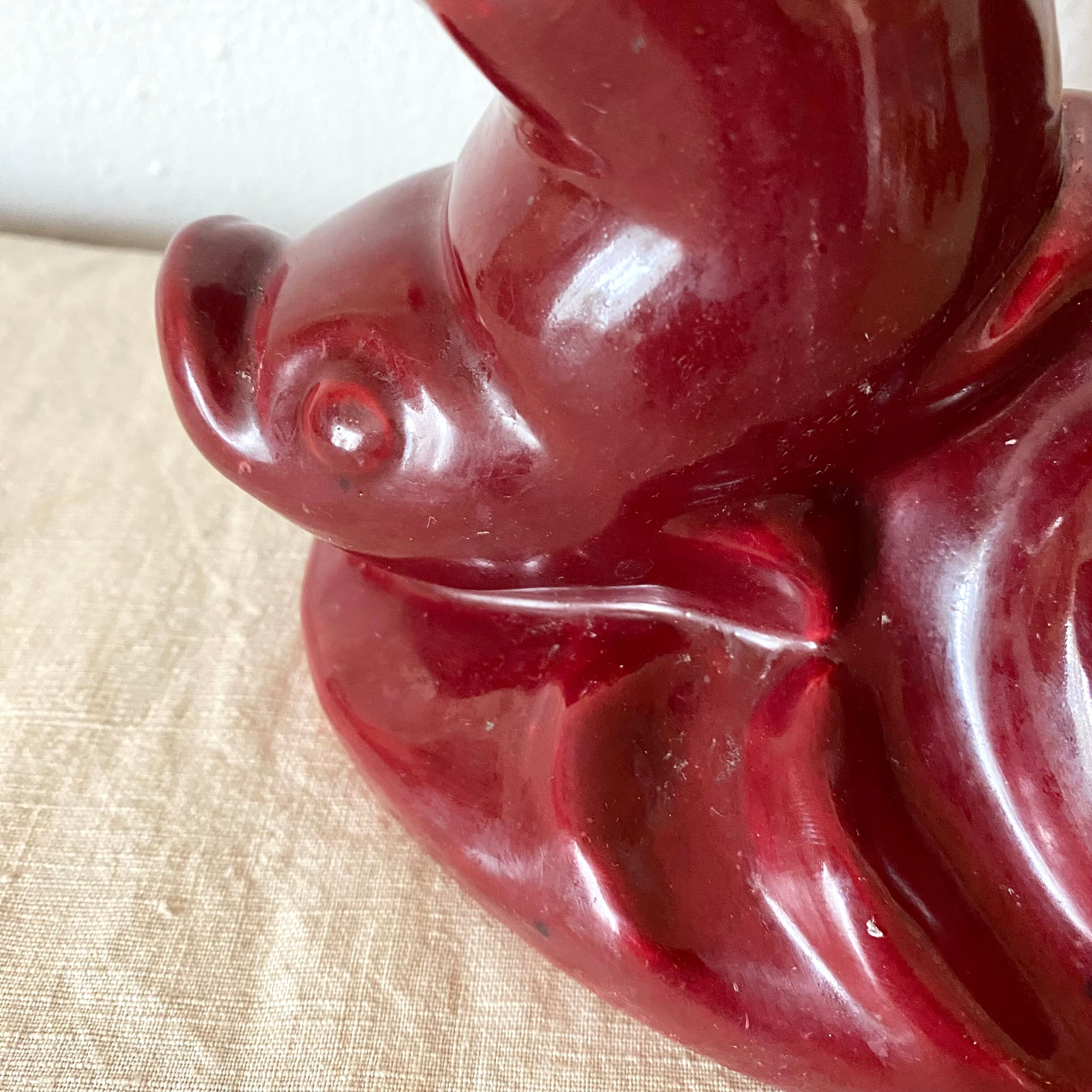 Red ceramic zoomorphic candle holder