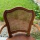 Cane and leather armchair in Louis XV style