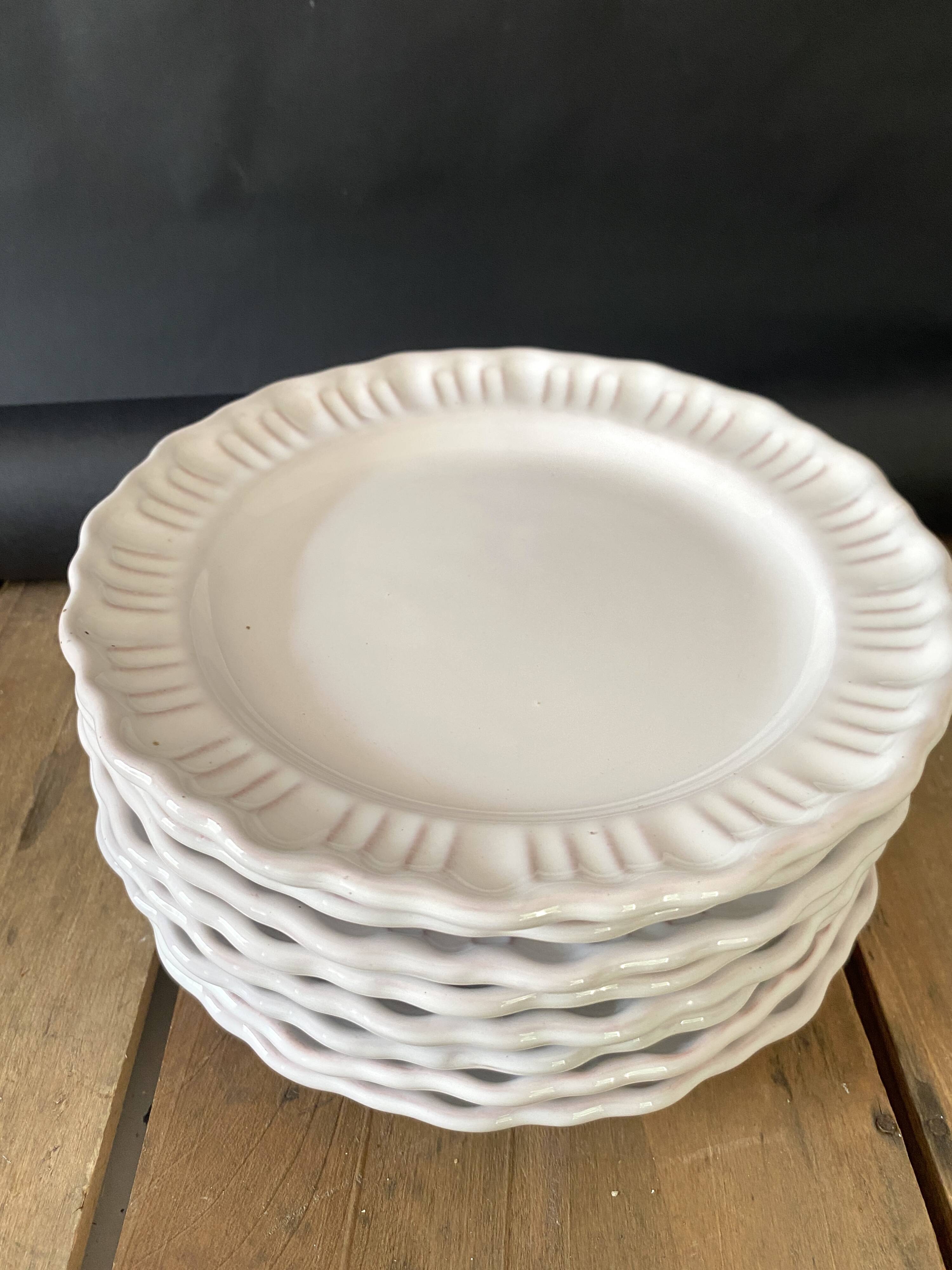 8 Provençal enamelled earthenware plates