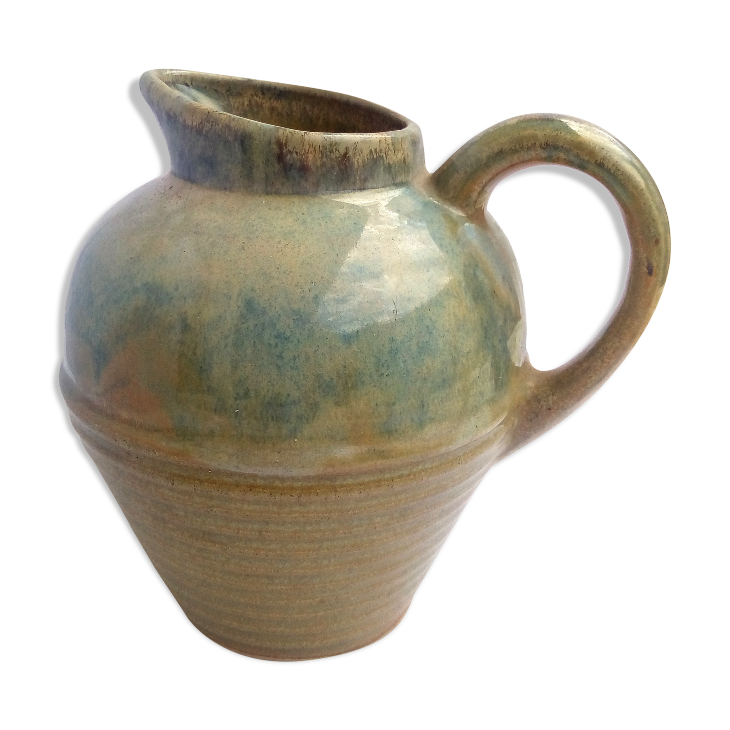 Blue enamelled sandstone pitcher and ochre streaks