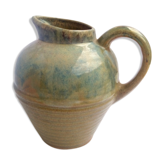Blue enamelled sandstone pitcher and ochre streaks
