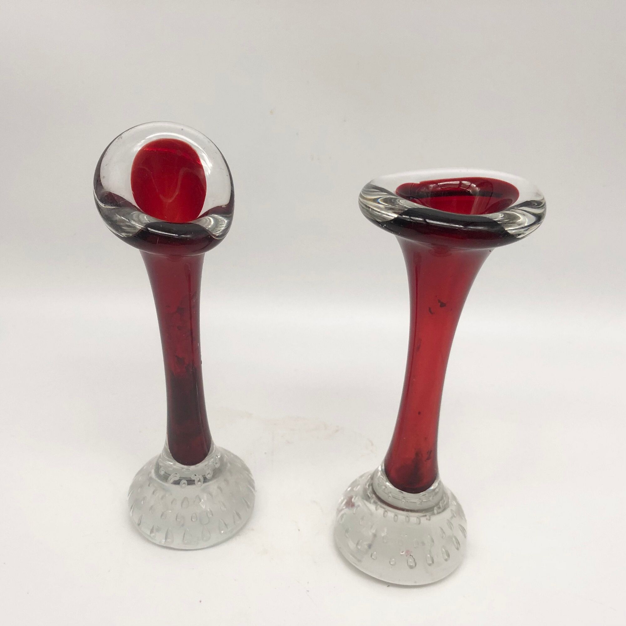 Duo of glass candle holders in the style of Murano