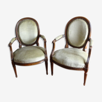 Pair of Louis XVI period armchairs, with medallion