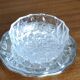 Crystal ravier on silver metal plate