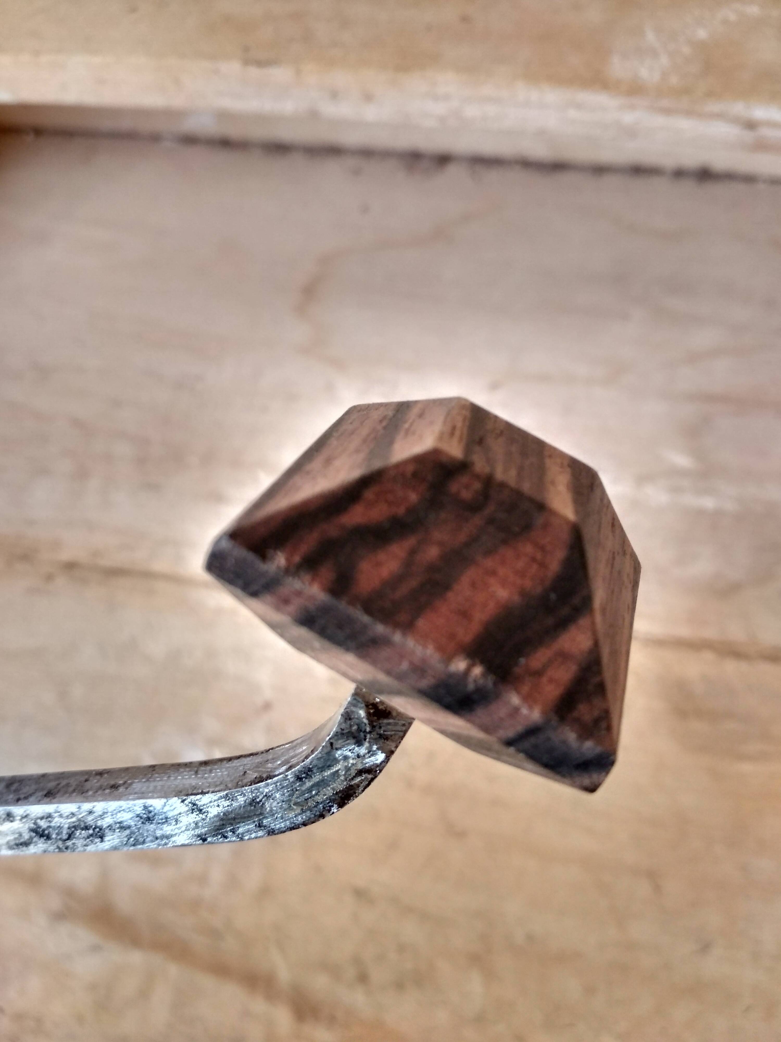 Old coat rack in metal and wood