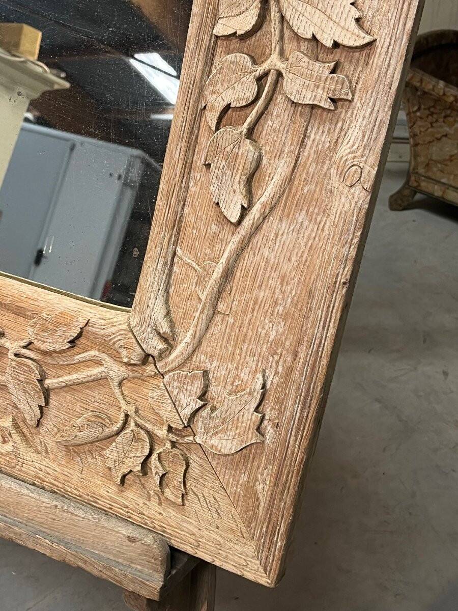 Art Nouveau mirror decorated with poppy leaves, signed by Roger père.