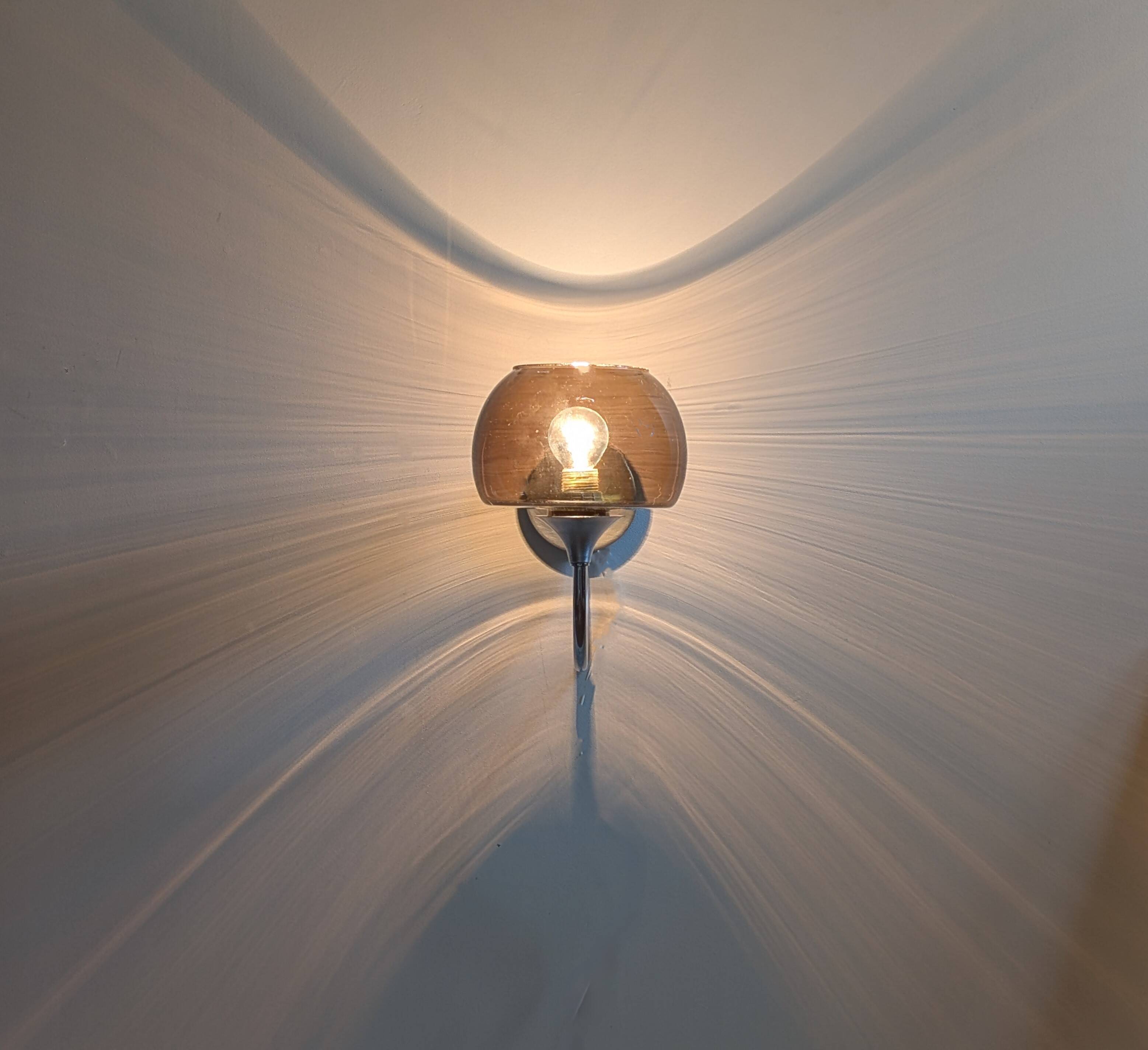 Pair of chrome and glass wall lights