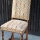 Restored and reupholstered antique chair with character
