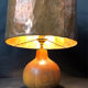 Vintage modernist lamp in wood and hammered copper.