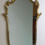 Bronze wall console and mirror.