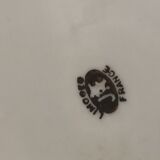 Plat en porcelaine de Limoges signé