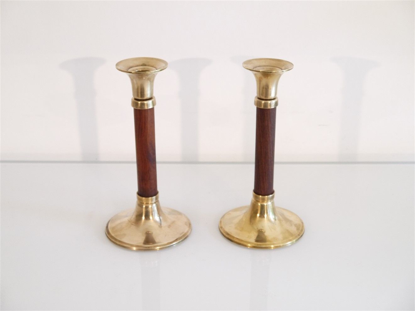 Pair of vintage Scandinavian candle holders in teak and brass 1960