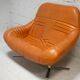 Sofa "space age". Leather, fiberglass, foam, steel. Circa 1970. Orange.