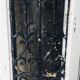 Old door with wrought iron grille