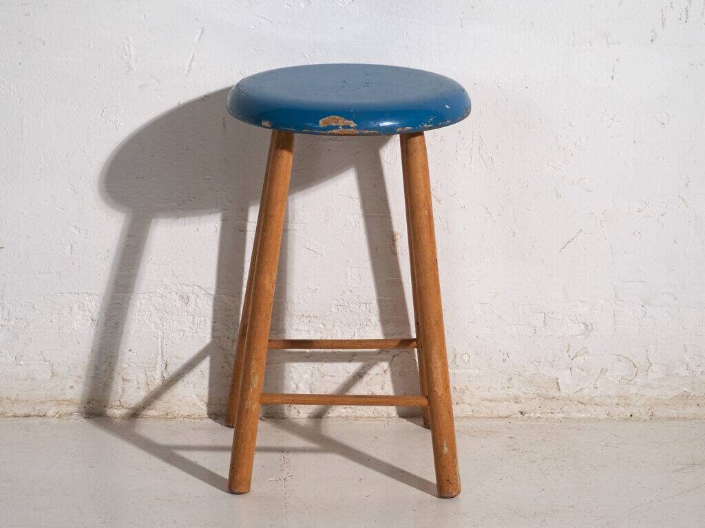 Antique wooden stool with a round seat – Central Europe, around 1950