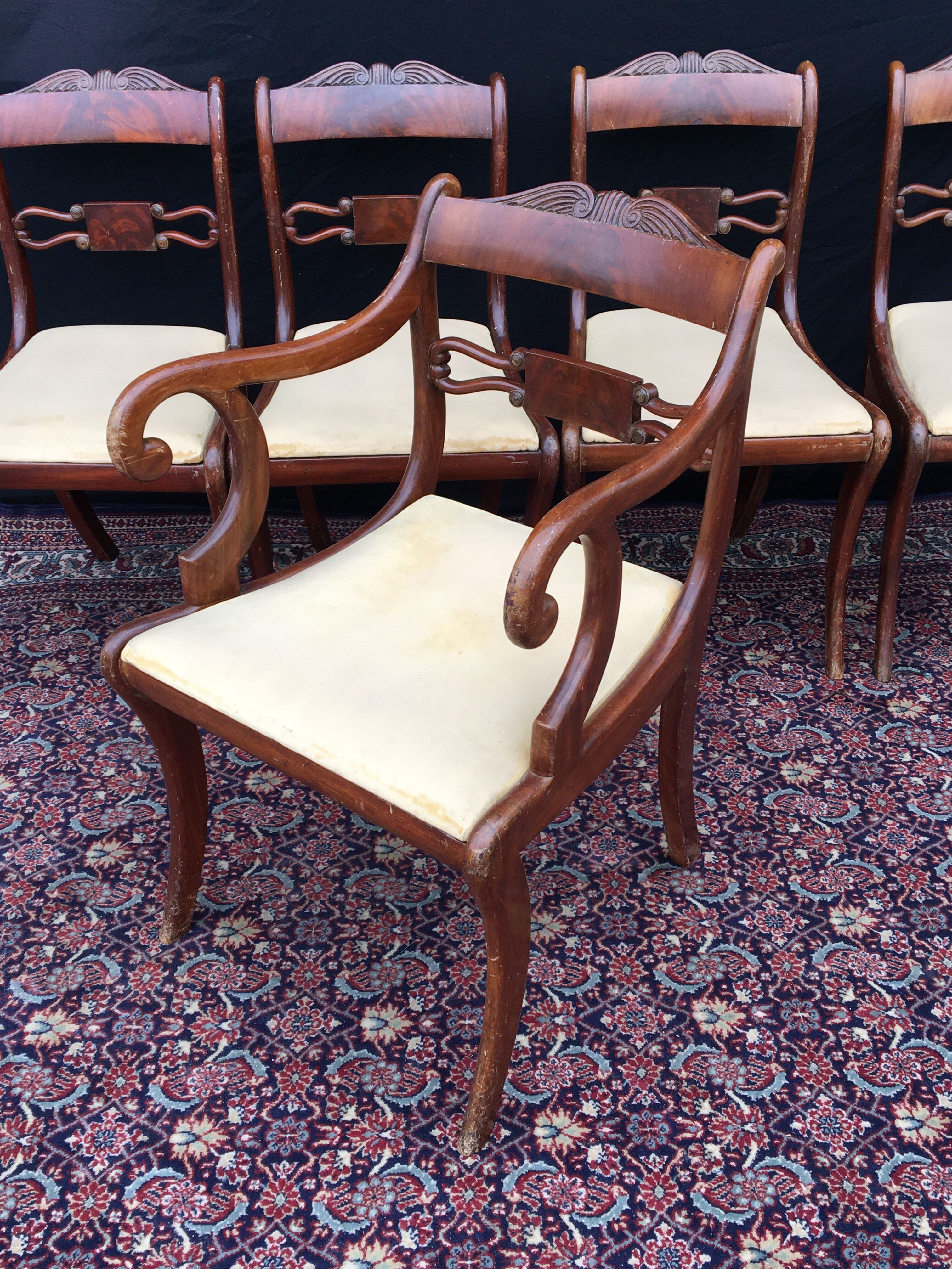 Set of 4 chairs and 1 armchair