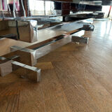 70s design coffee table in rectangular glass with chrome legs.