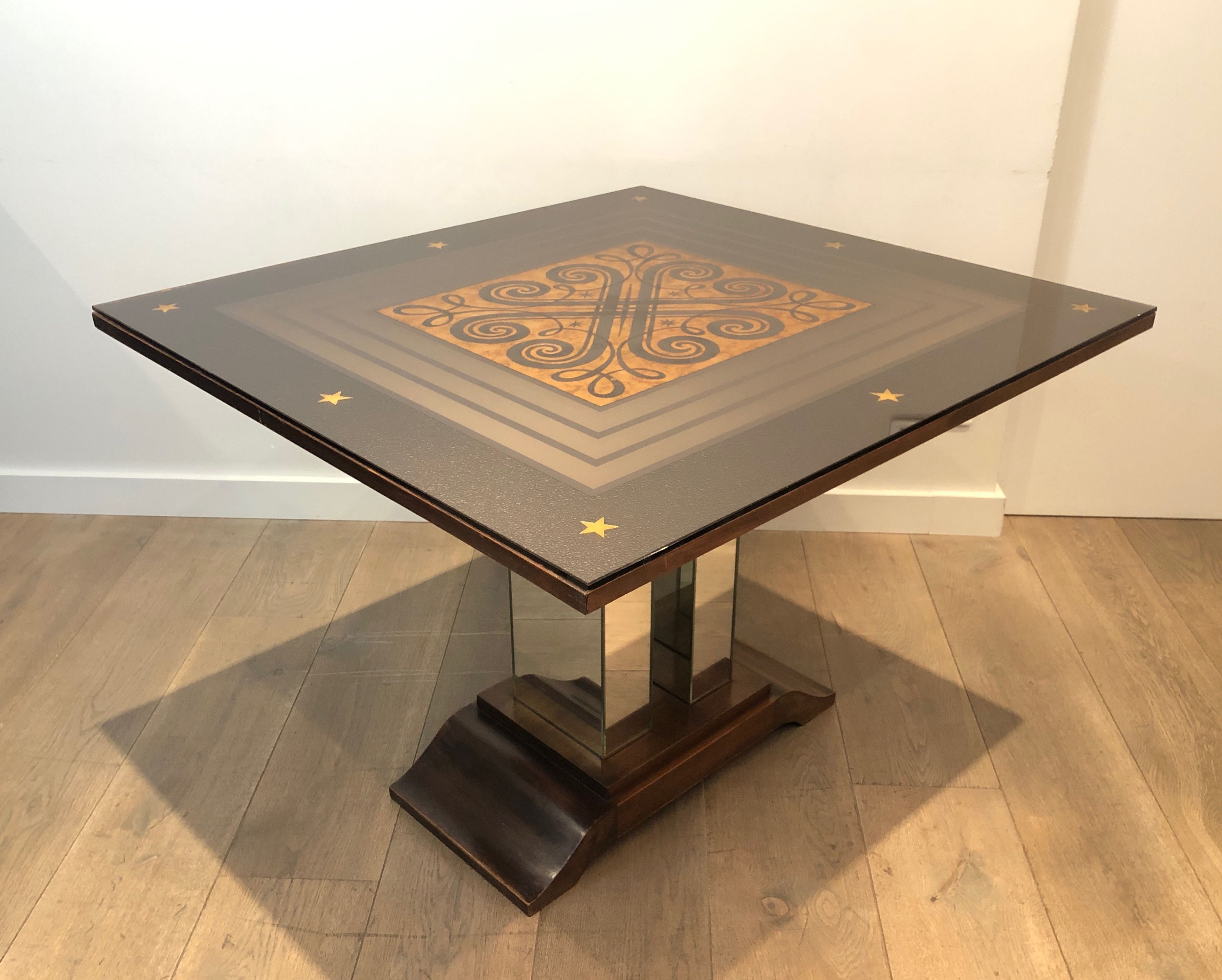 Art Deco centre table with a mirrored eglomisé top in the style of Jules Leleu and Max Ingrand.