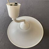 Suspension of the 80s in perforated white metal