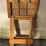 Wooden and cane bedside table