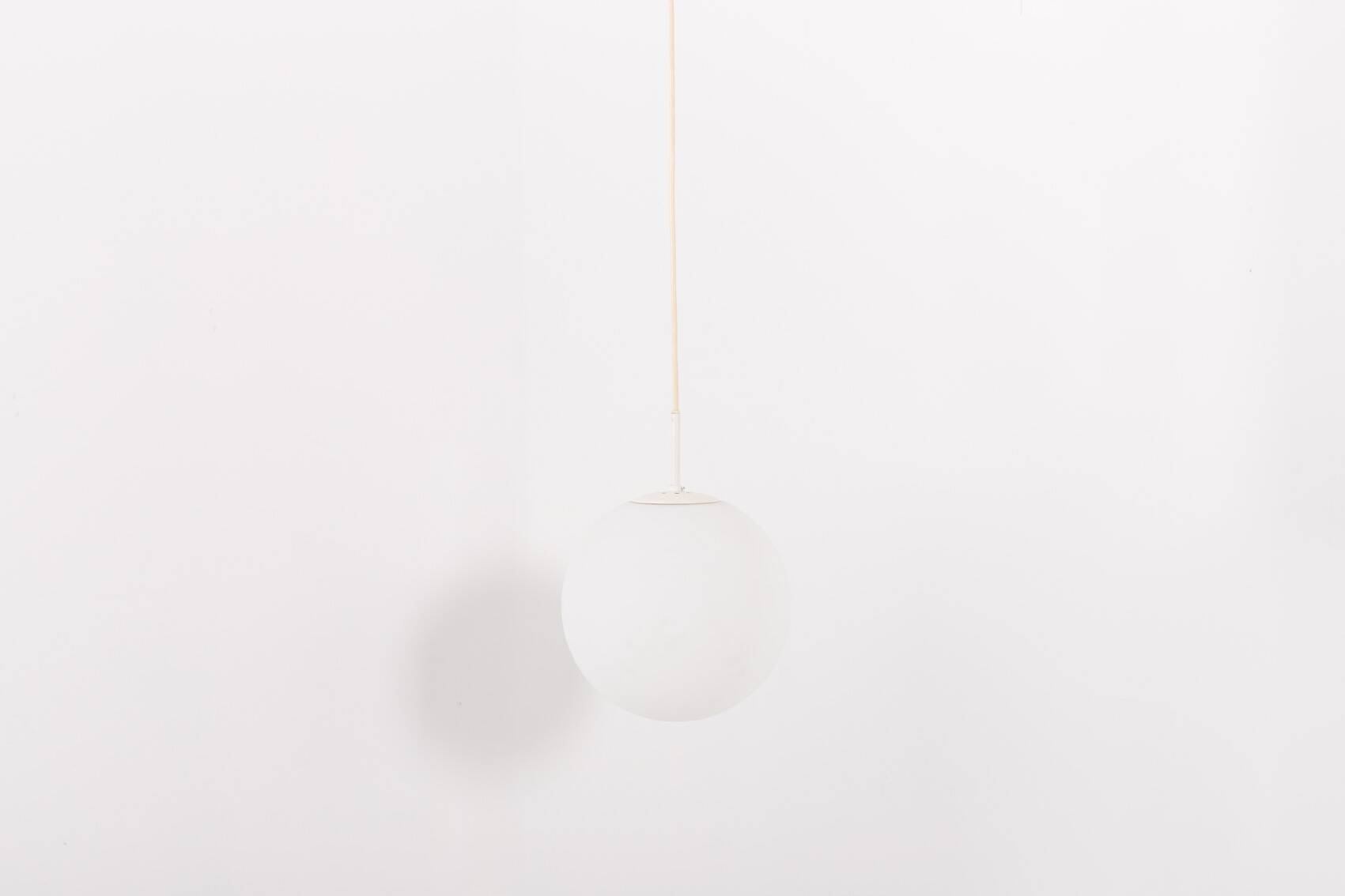 Large opaline glass Raak Amsterdam Globe pendant