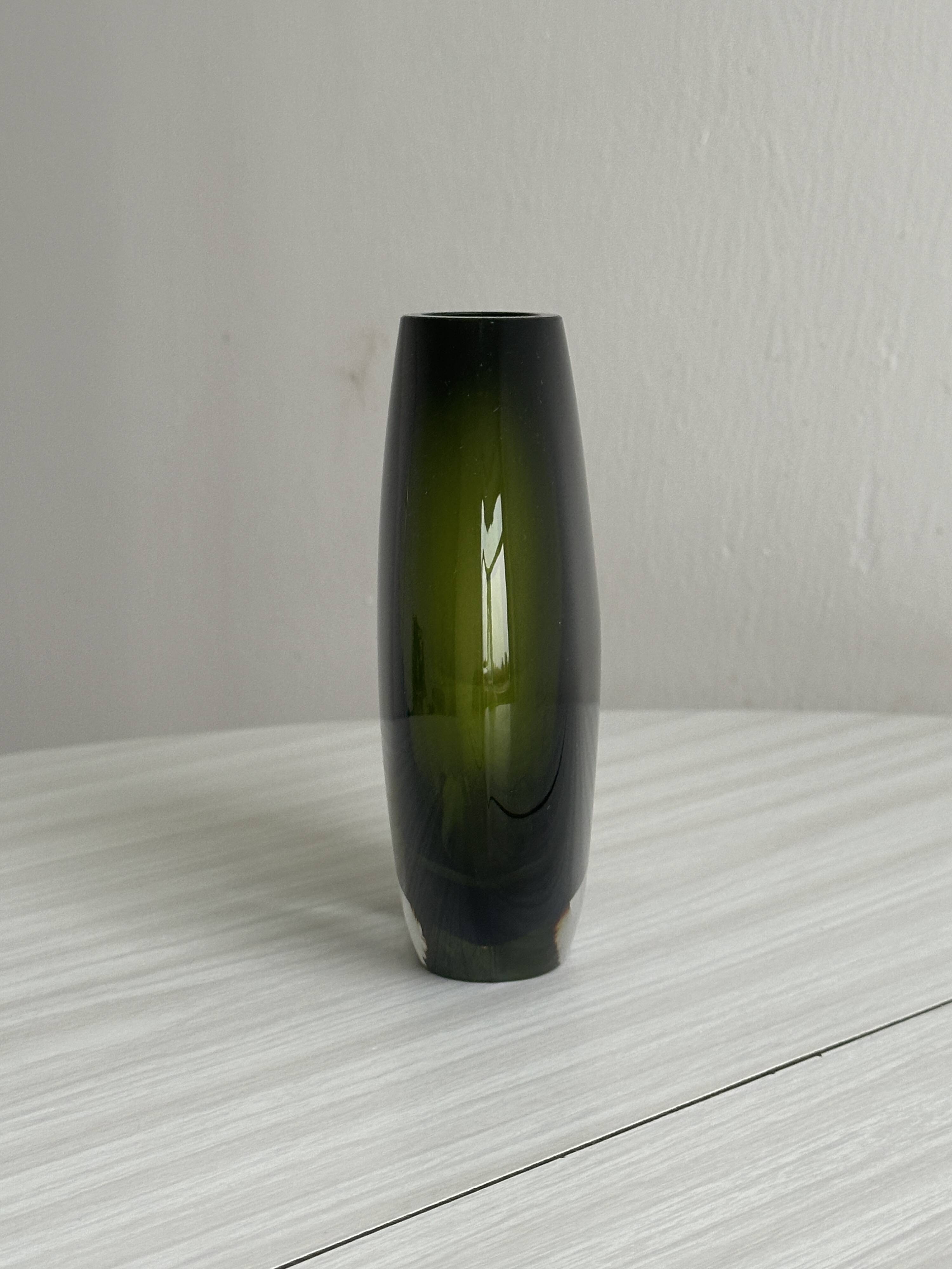 Blown green glass vase