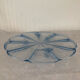 Blue transparent glass pie dish on vintage stand