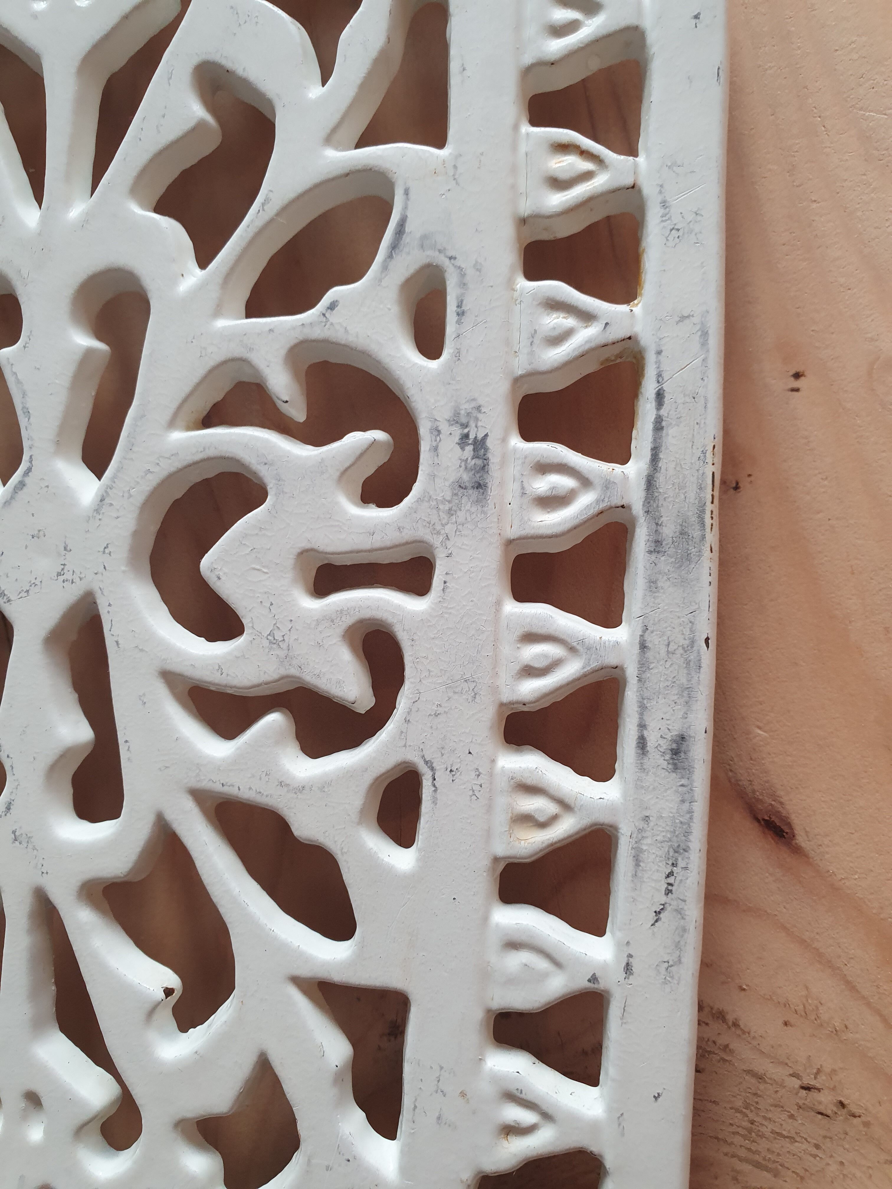 Dessous de plat en fonte