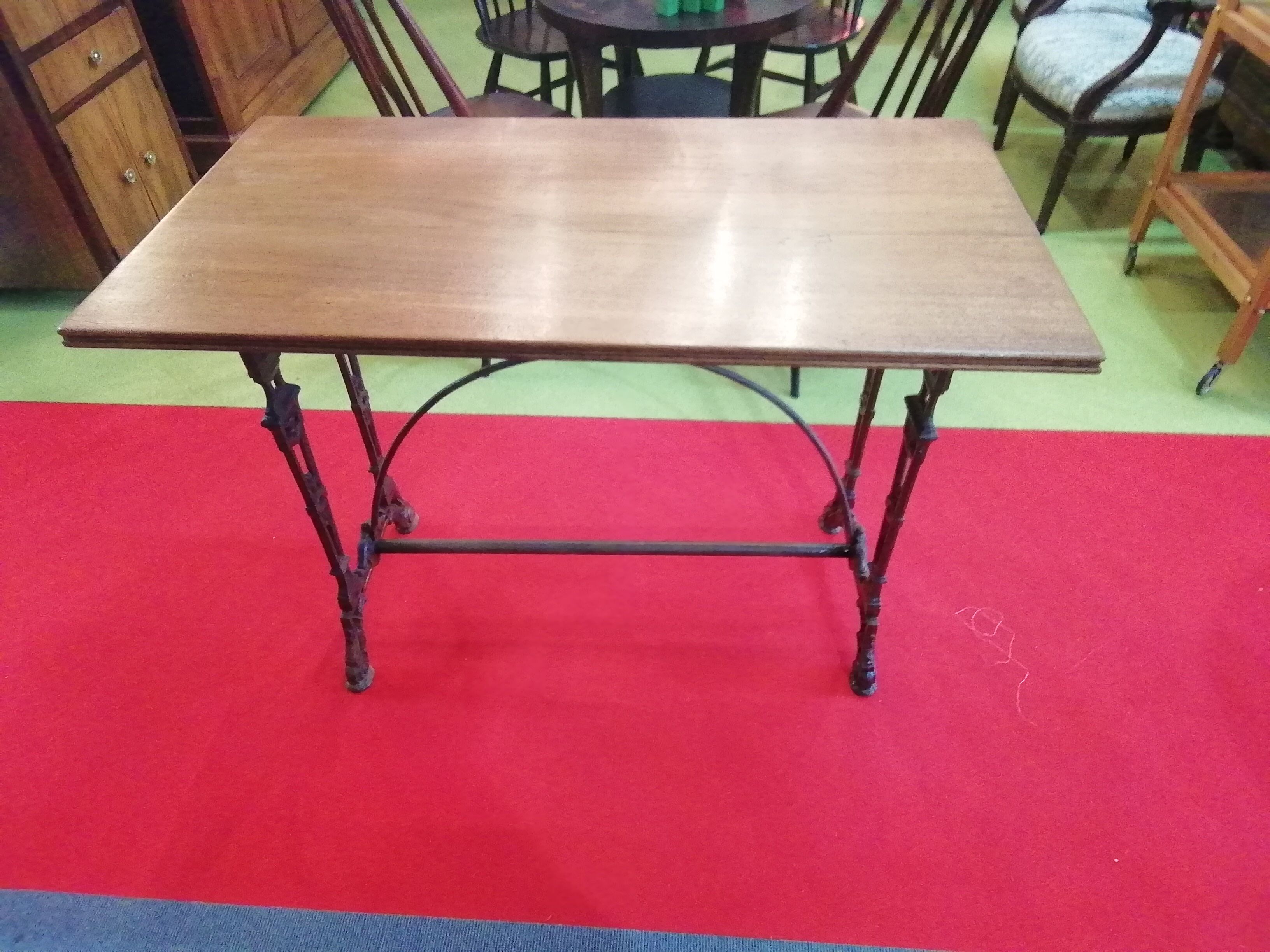 Bistro table over wood cast iron legs