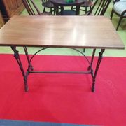 Bistro table over wood cast iron legs