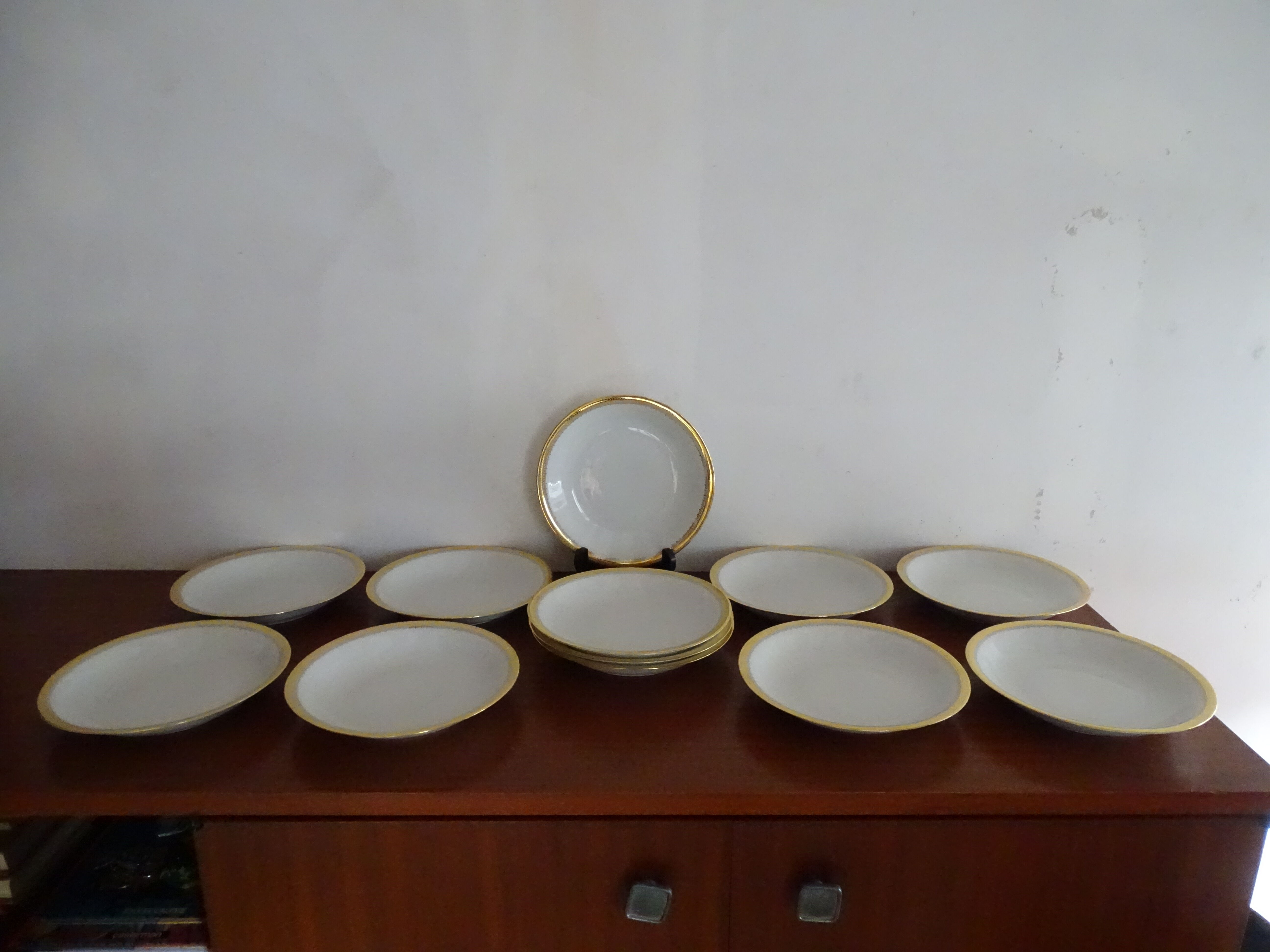 12 hollow plates porcelain of Sologne Larchevèque white and golden signed