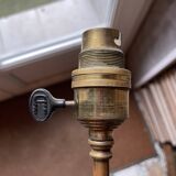 Rare articulated tripod base table lamp in gold-plated brass