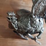 2 silver metal roosters