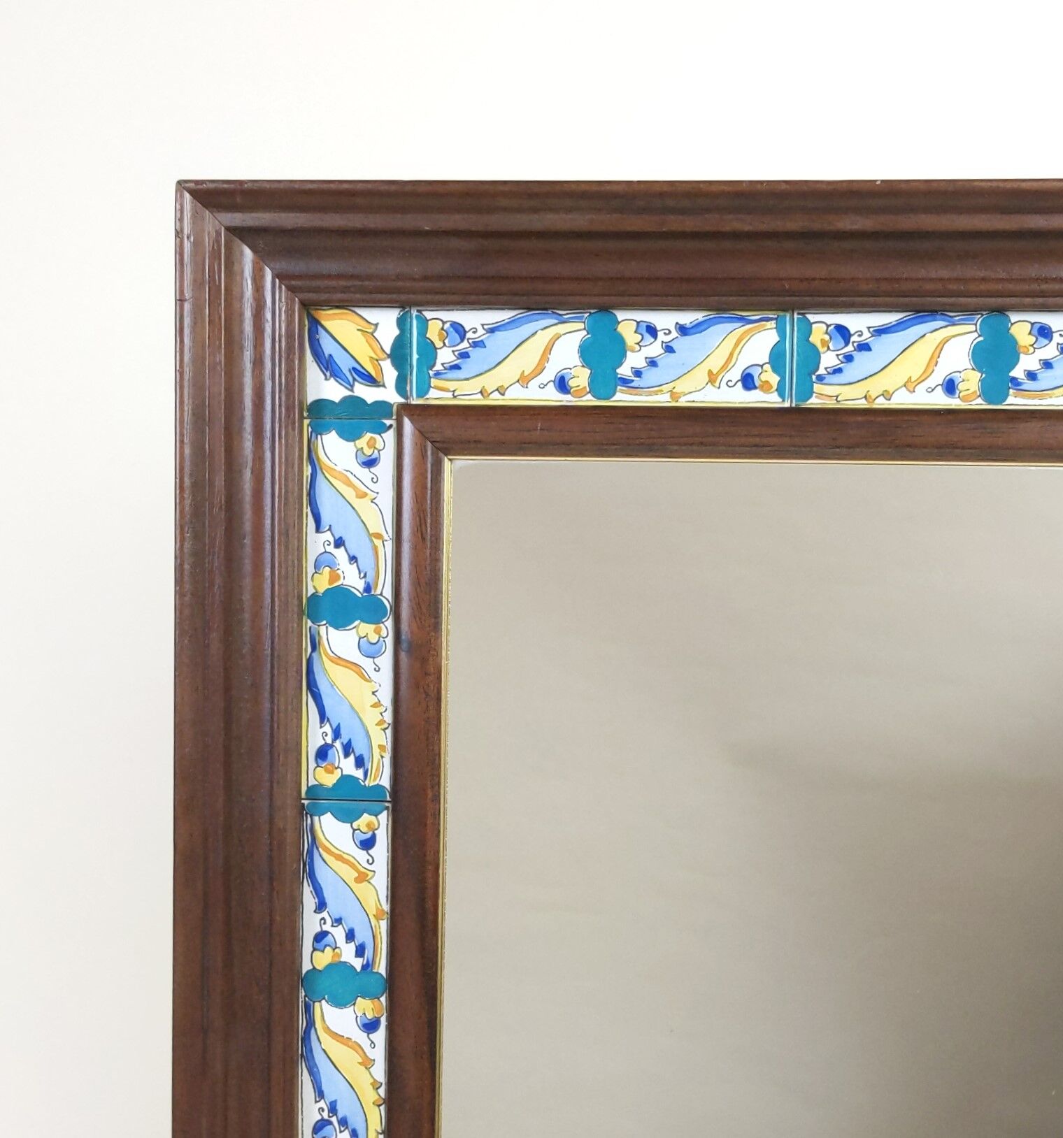 Mirror with wooden frame and painted ceramic tiles