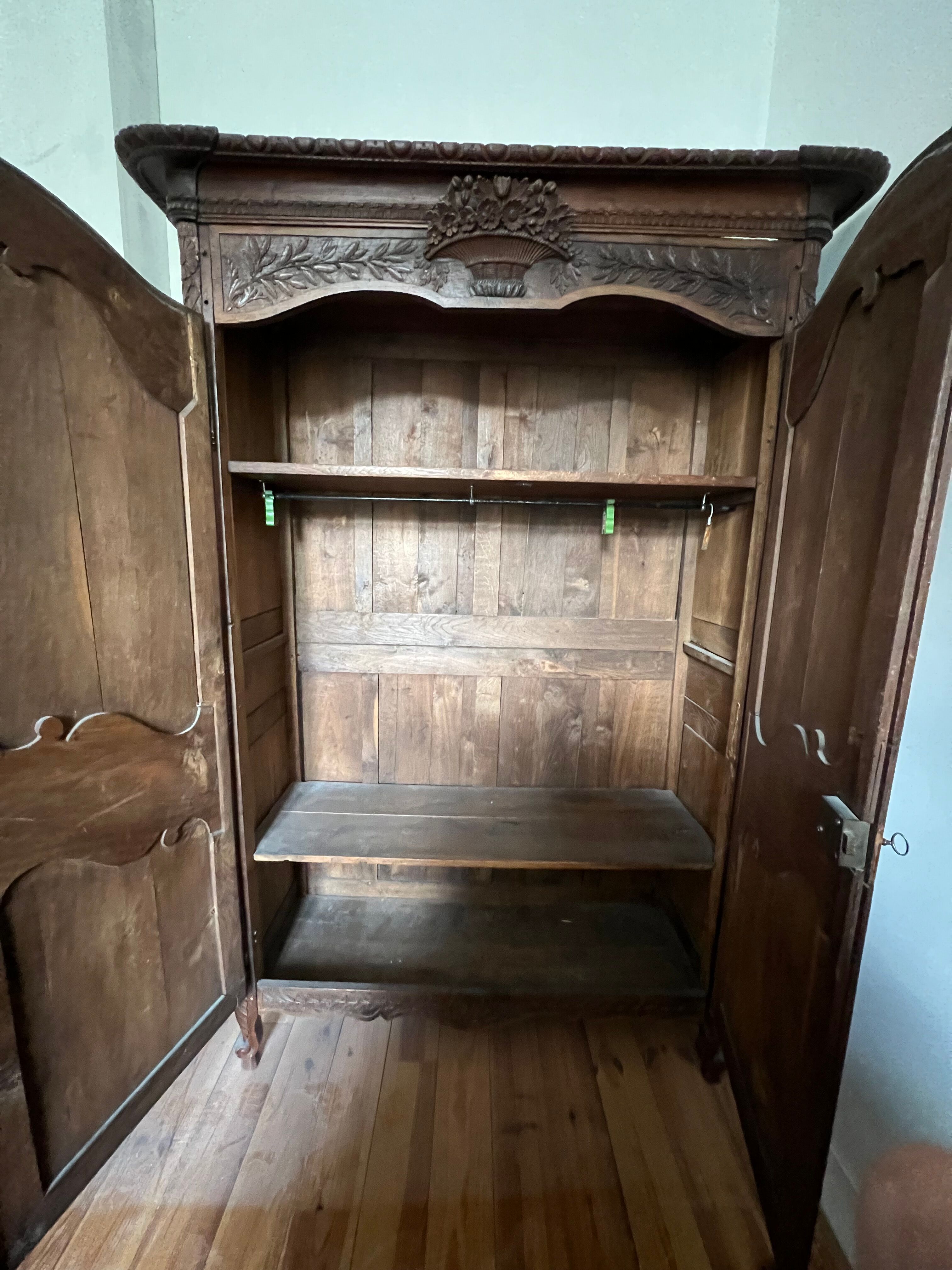 Beautiful and ancient Norman wedding wardrobe, richly carved