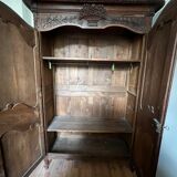 Beautiful and ancient Norman wedding wardrobe, richly carved