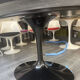 Saarinen & Knoll International: Tulip table, marble marquina and black rilsan