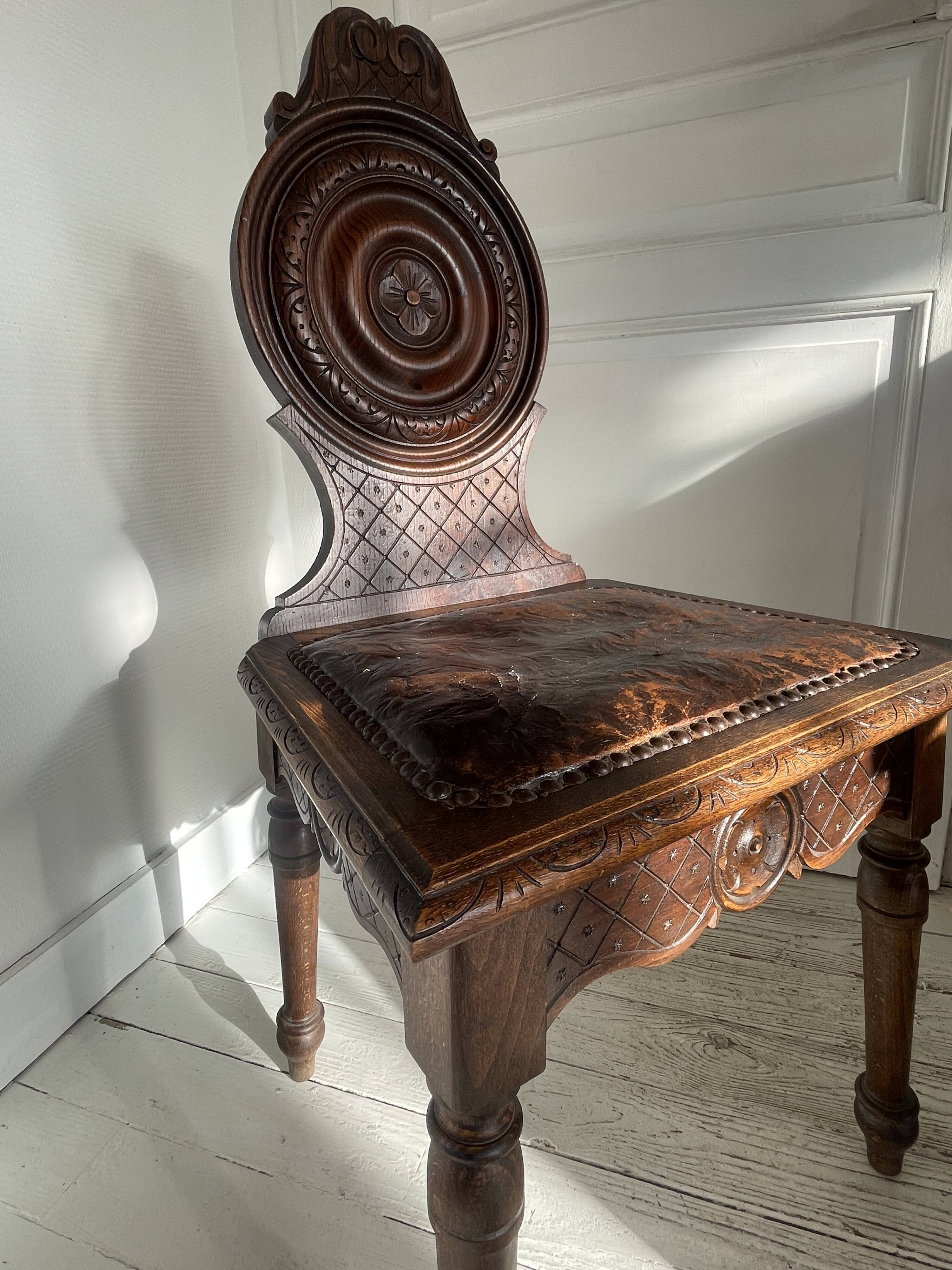 Wooden chair with Breton leather seat