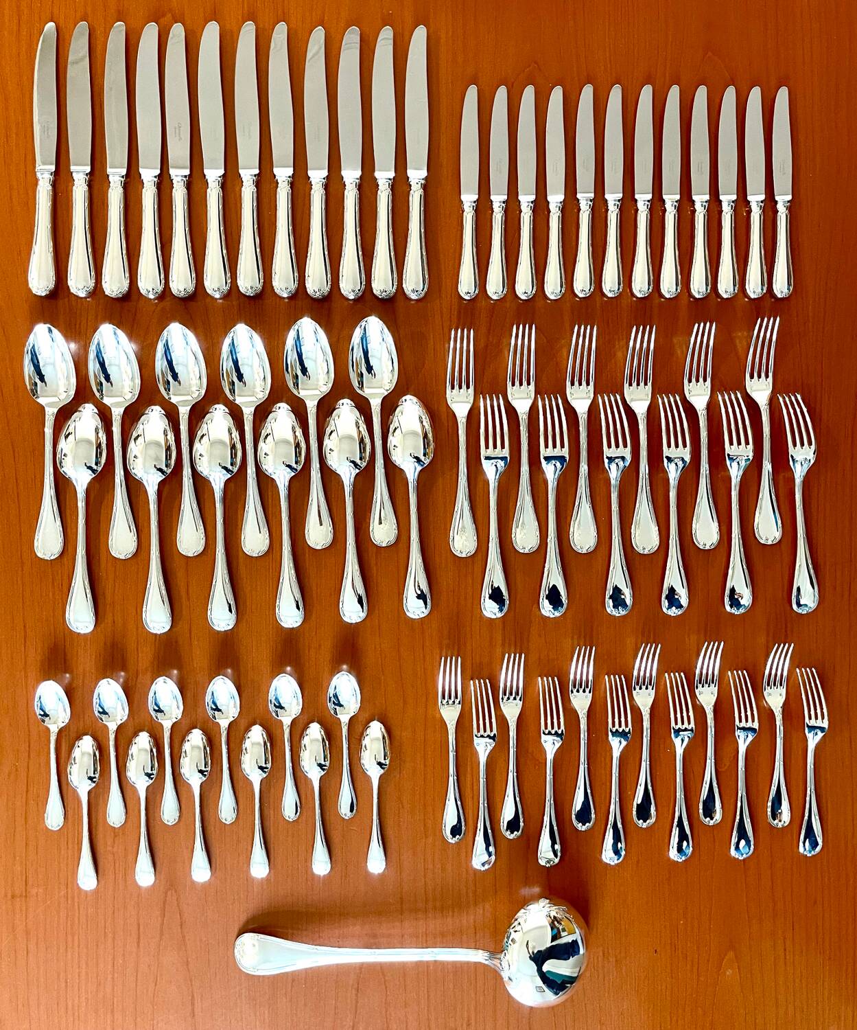 Christofle crossed ribbons, 73-piece cutlery set in new condition.