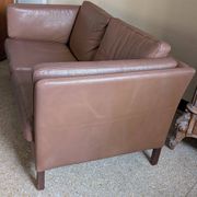 Brown leather Scandinavian two-seater sofa