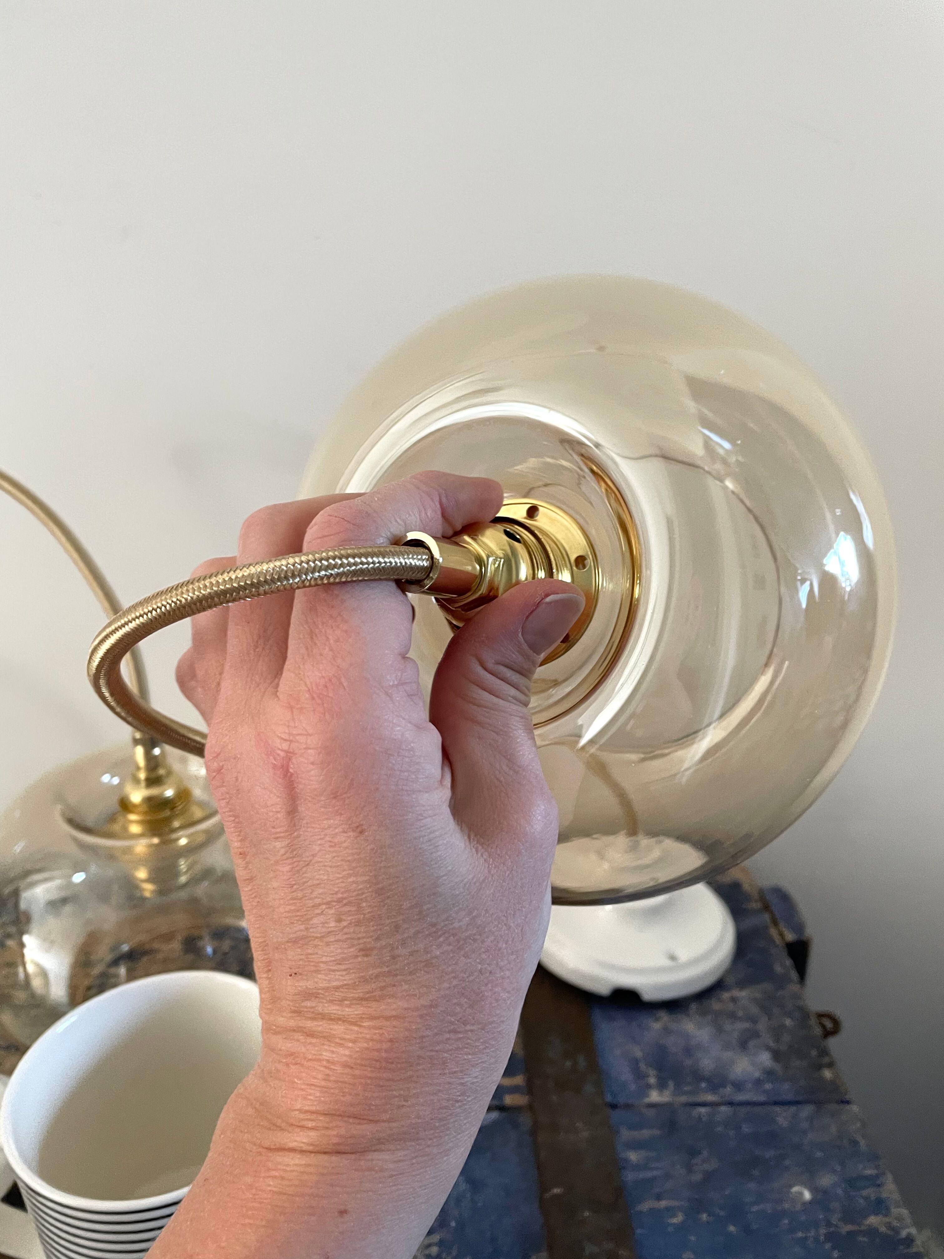 Set of three new electrified golden glass pendant lamps