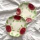 2 old slip plates decorated with roses
