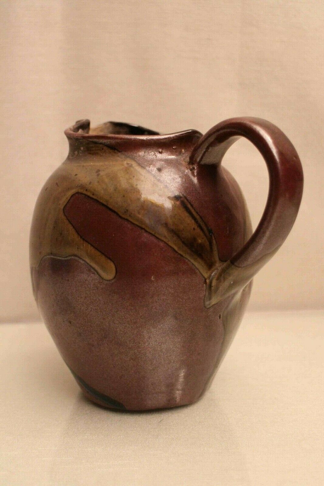 Pitcher in glazed sandstone