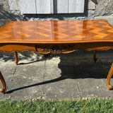 Antique extendable table in cherry wood and marquetry in the Louis XV style.